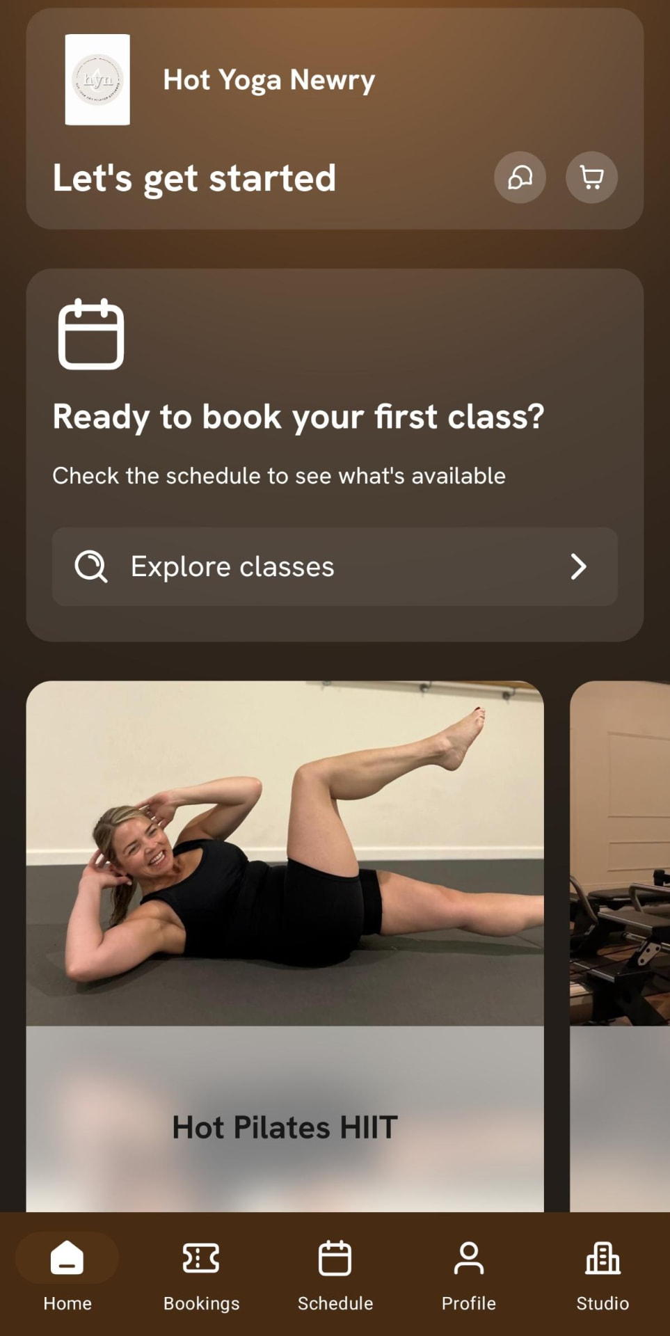The Hot Yoga Newry app home screen: Let's get started, and a card asking Ready to book your first class?